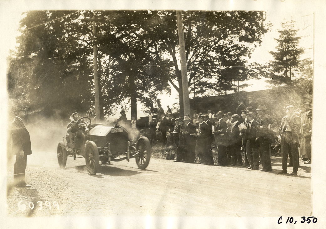 Driver in racecar, 1910 White Plains Hill Climb