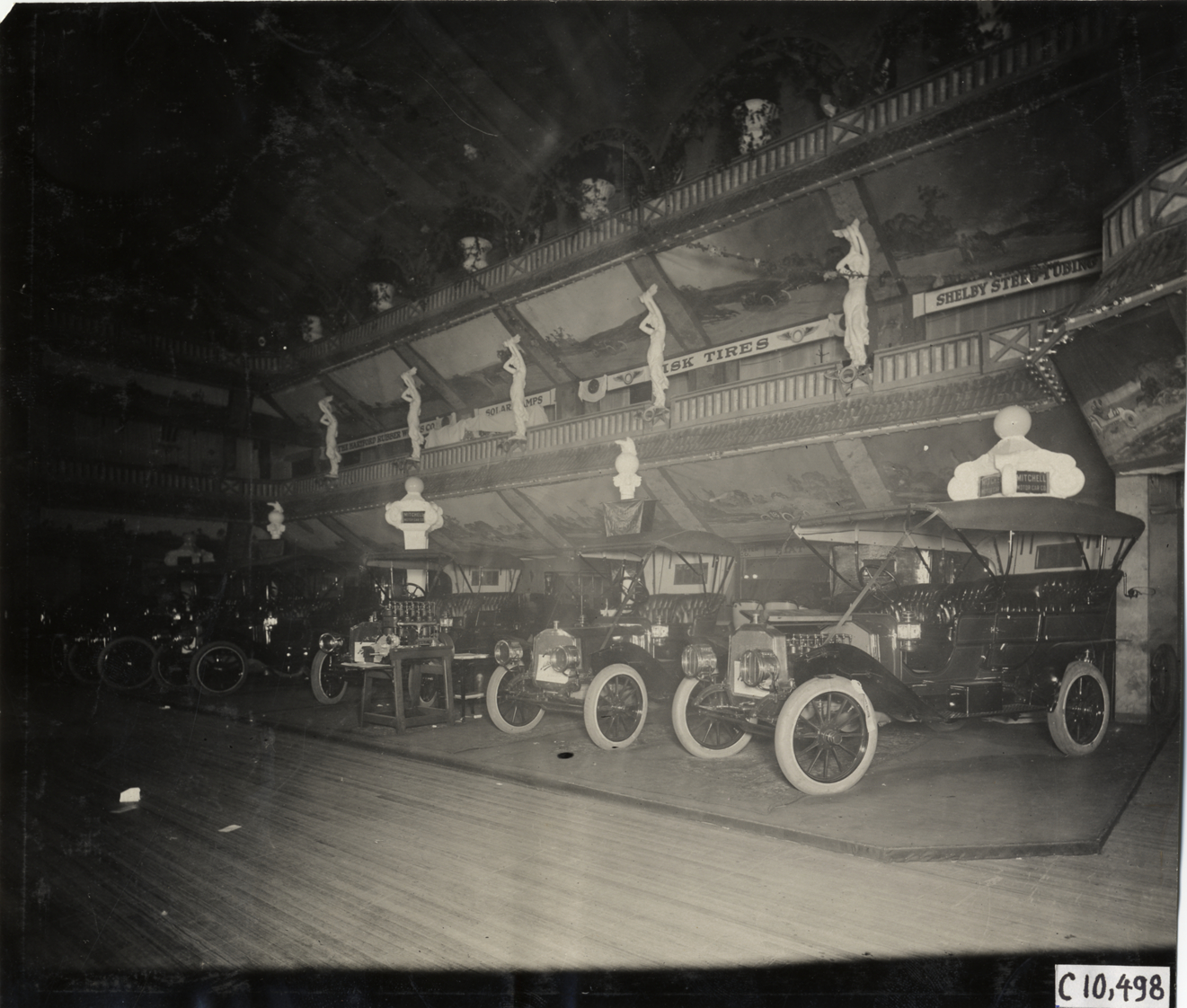 1909 Mitchell automobiles on display