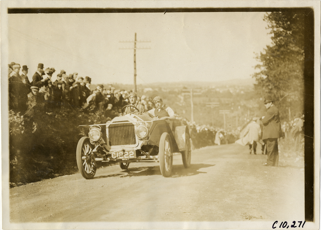 Driver and passenger in racecar, 1910 Shingle Hill Climb
