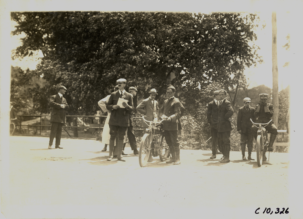 Group of men standing with motorcyclists, 1910 White Plains Hill Climb