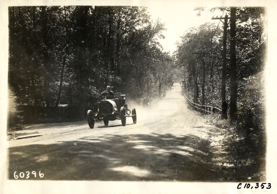 Driver in racecar, 1910 White Plains Hill Climb