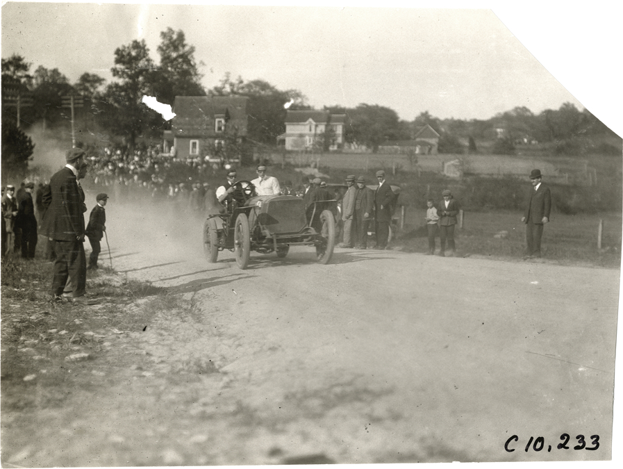 A. Beebe driving Lozier racecar, 1909 Shingle Hill Climb