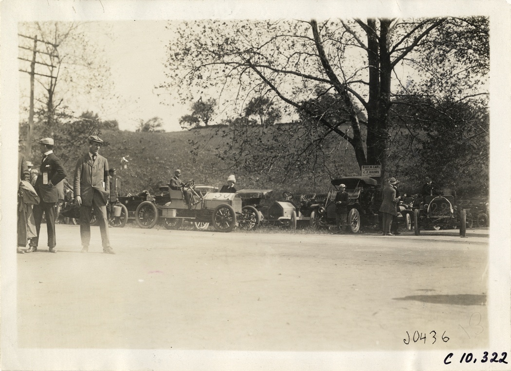 Racecars parked on roadside, 1910 White Plains Hill Climb