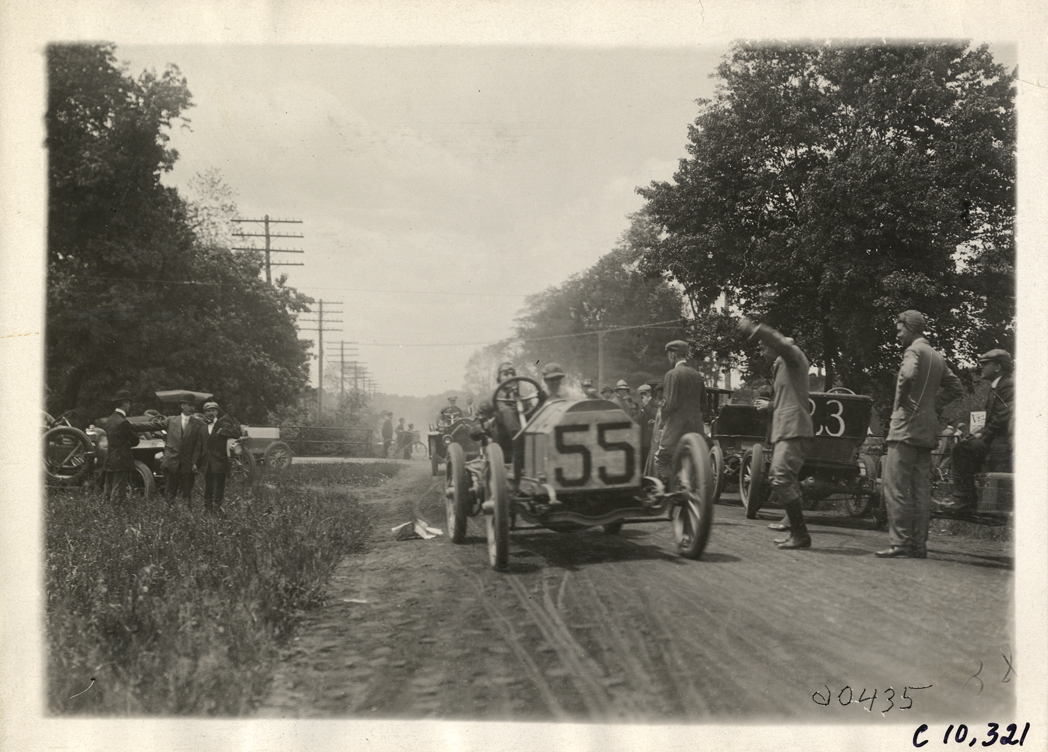 Driver and passenger in racecar, 1910 White Plains Hill Climb