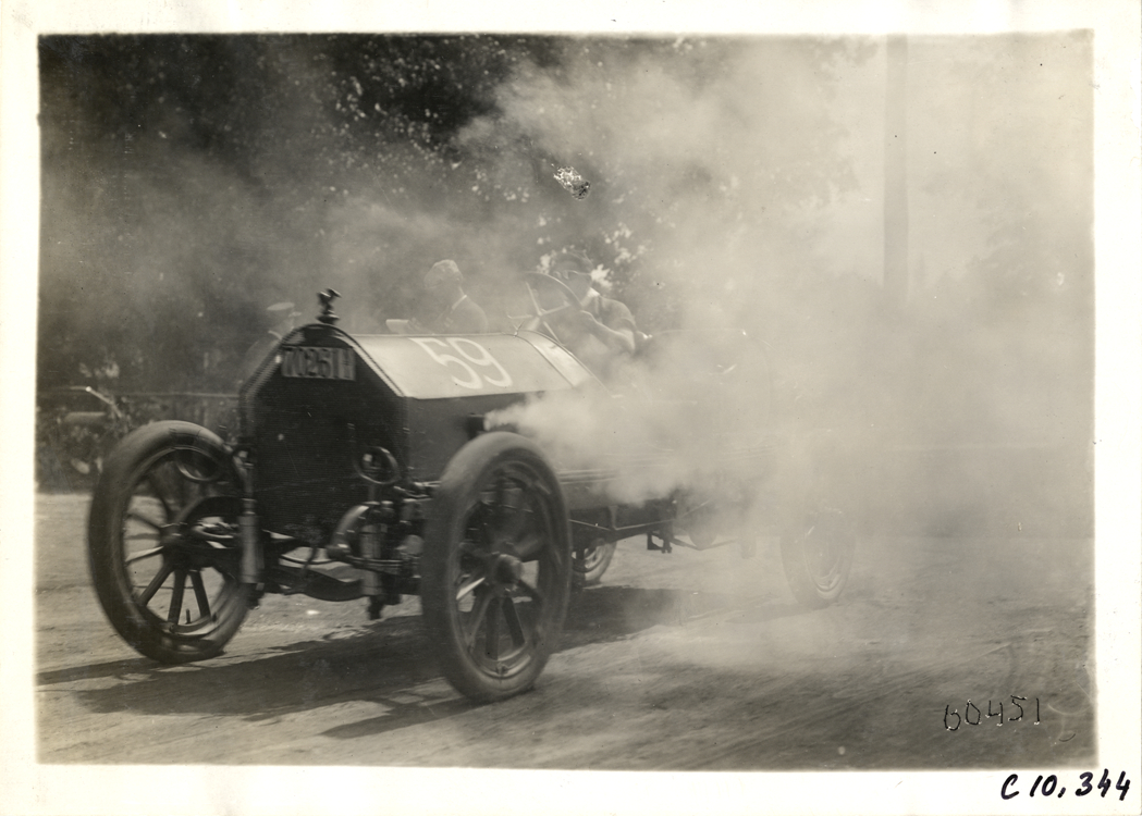 Driver in racecar, 1910 White Plains Hill Climb