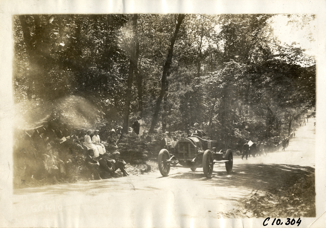 Driver in racecar, 1910 White Plains Hill Climb