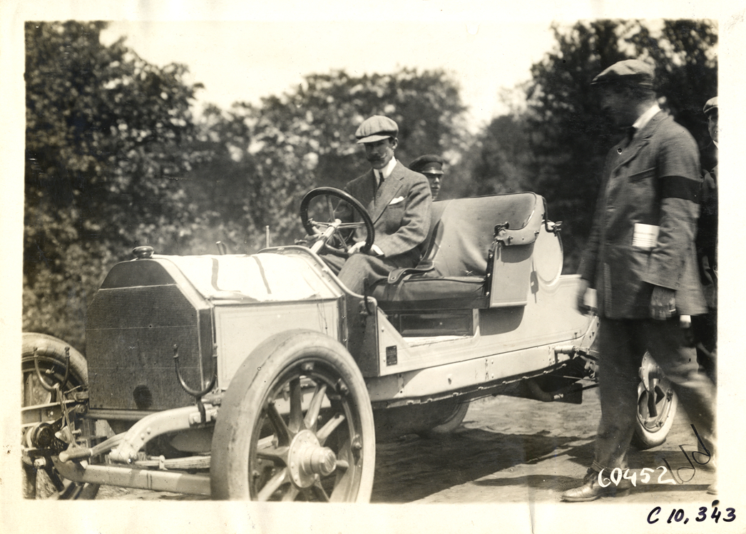 Driver in racecar, 1910 White Plains Hill Climb
