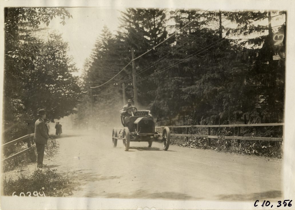 Driver in racecar, 1910 White Plains Hill Climb