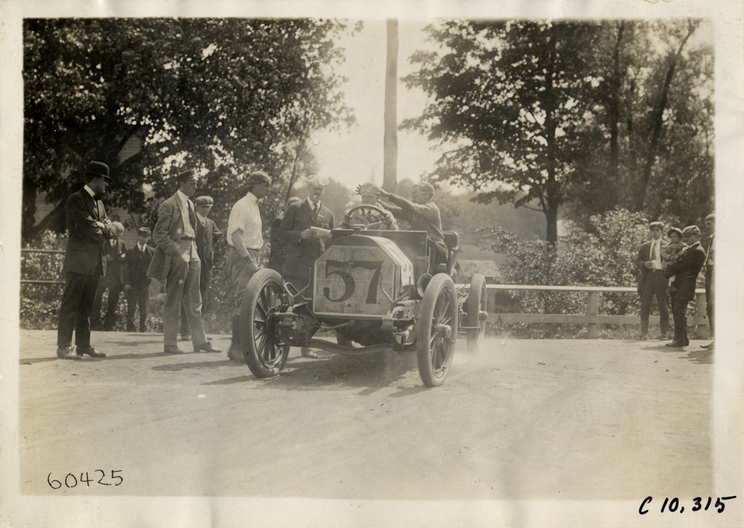 Driver in racecar, 1910 White Plains Hill Climb
