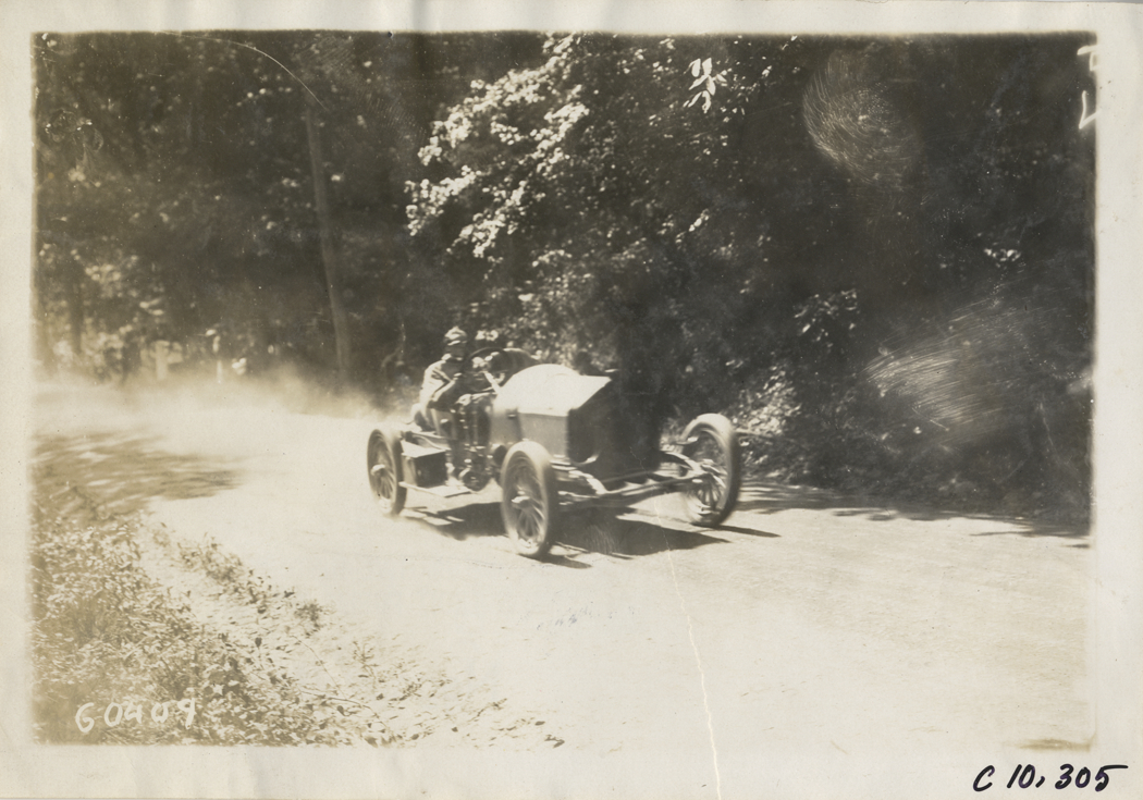 Driver in racecar, 1910 White Plains Hill Climb