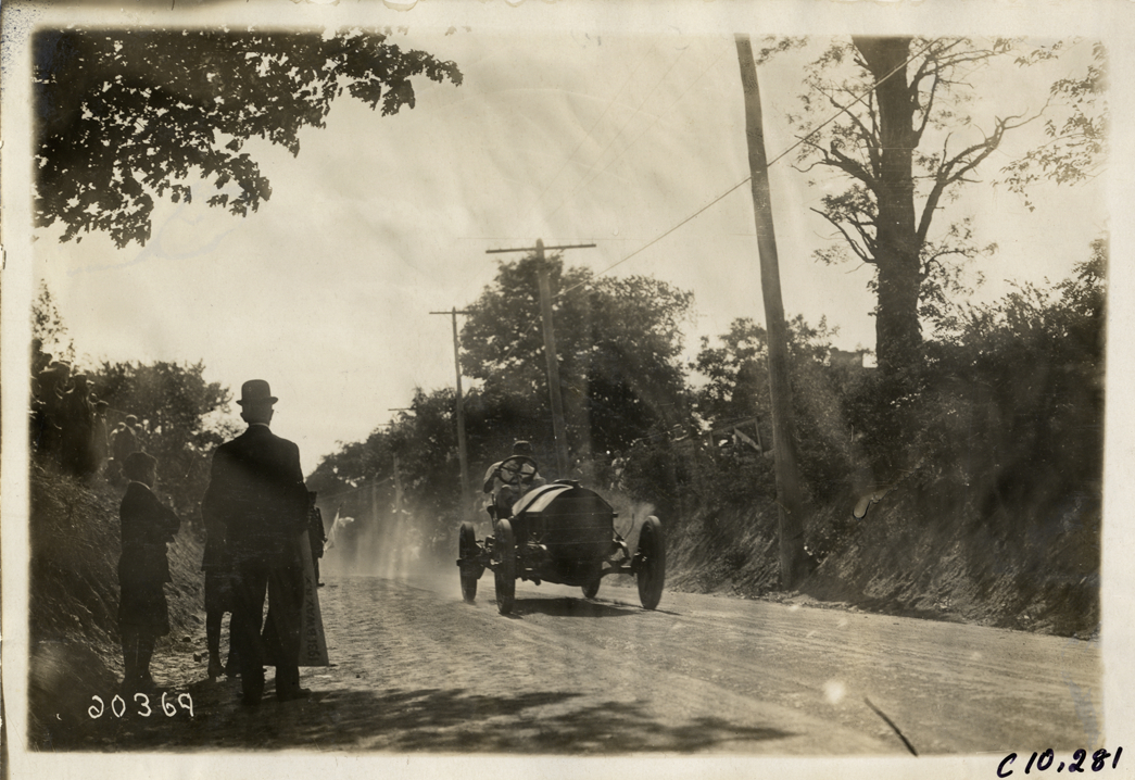 Driver in racecar, 1910 White Plains Hill Climb