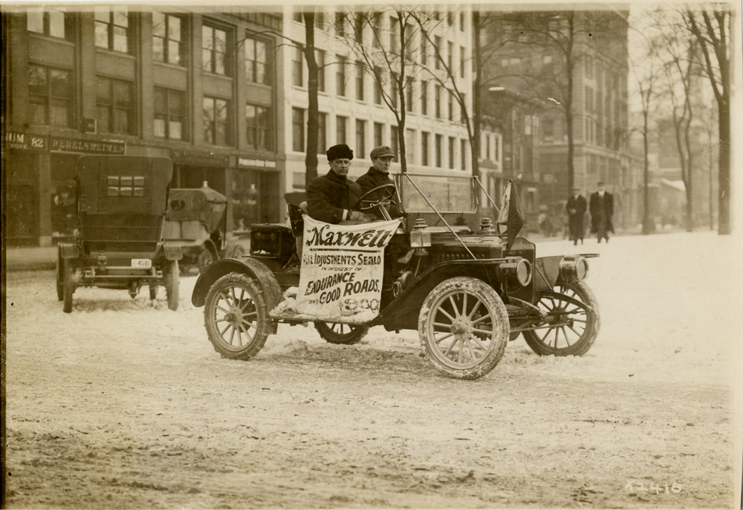 Driver and passenger in 1909 Maxwell Model K.A. automobile