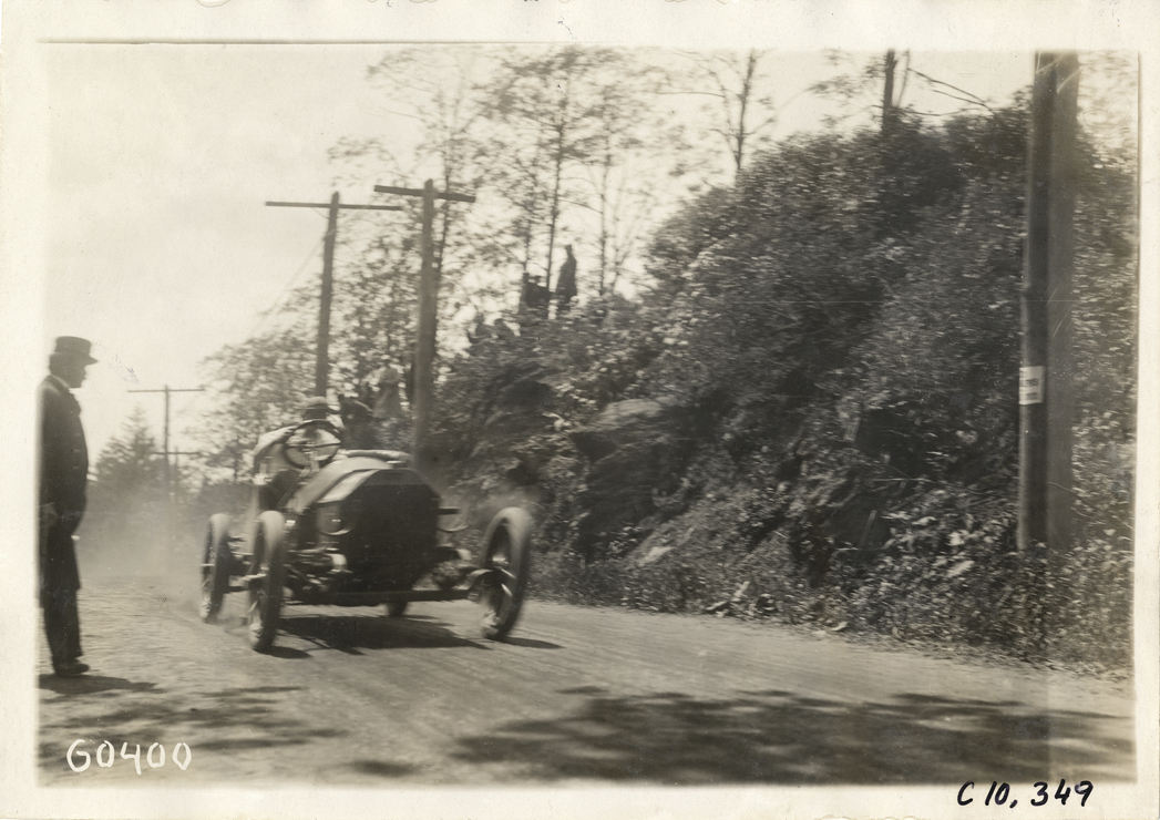 Driver in racecar, 1910 White Plains Hill Climb