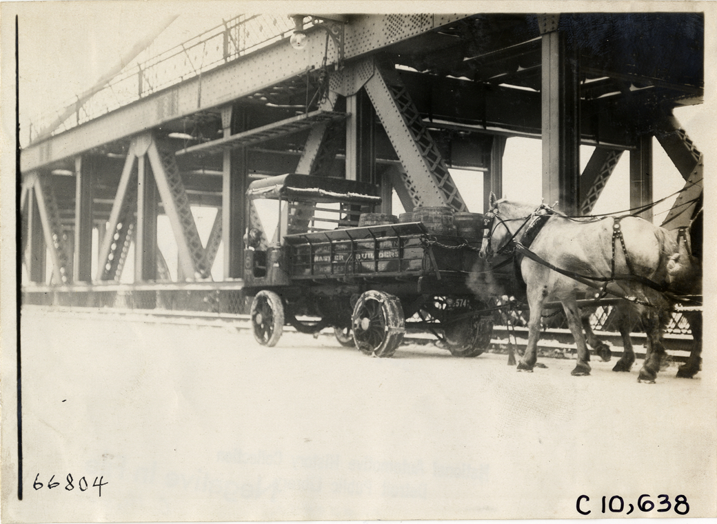 1911 Morgan truck, traveling on bridge
