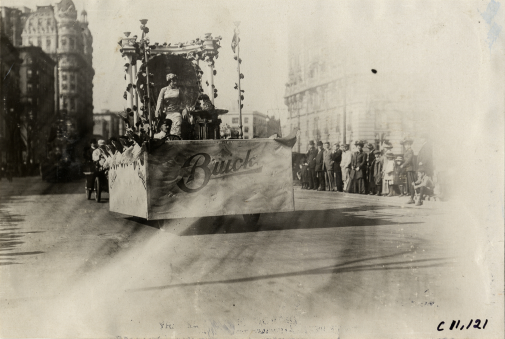 Annette Kellerman riding on Buick float, 1909 New York automobile carnival