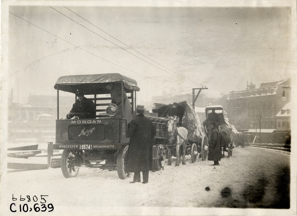 1911 Morgan truck, traveling on snow-covered road