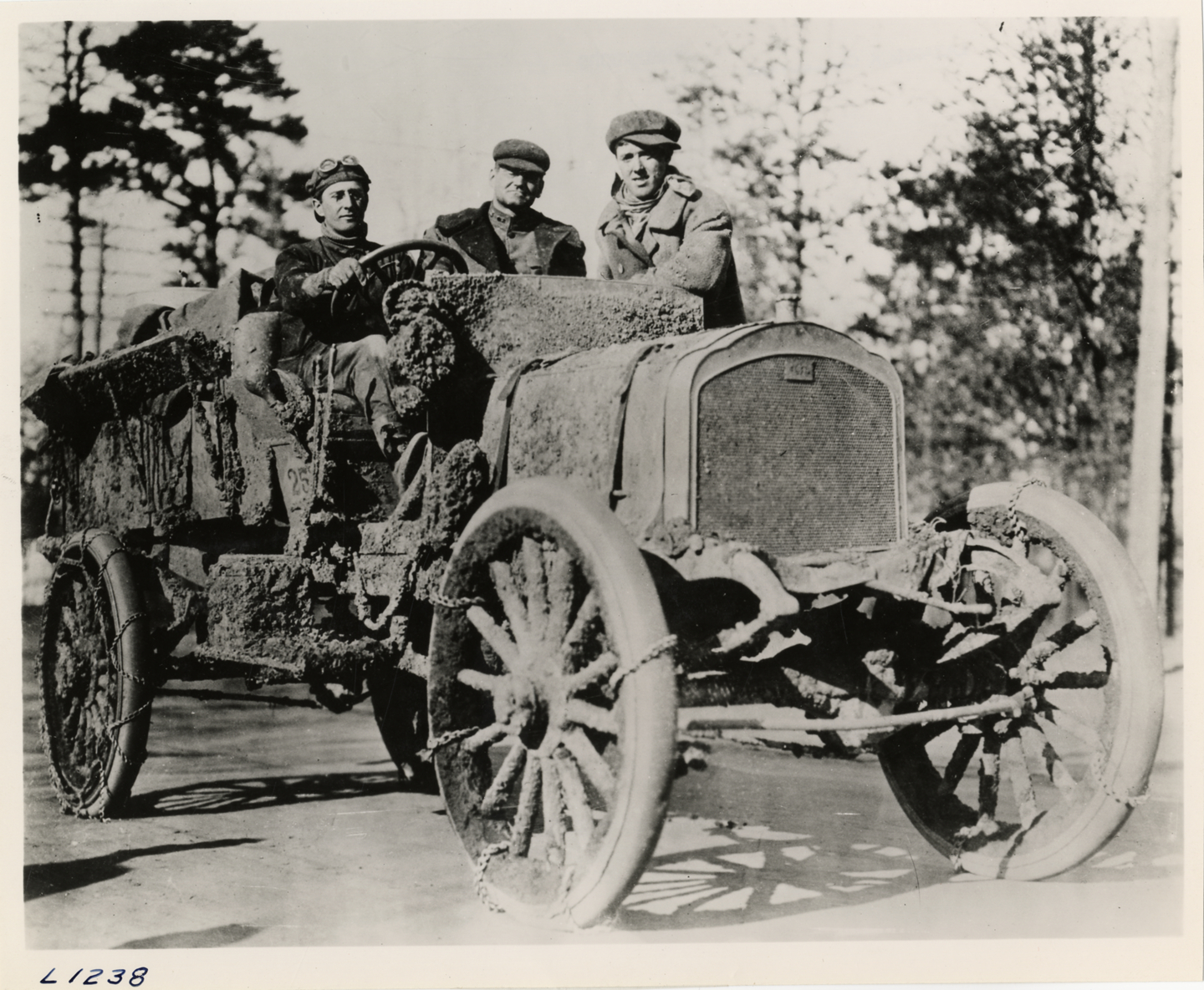 Driver and passengers in F-W-D truck