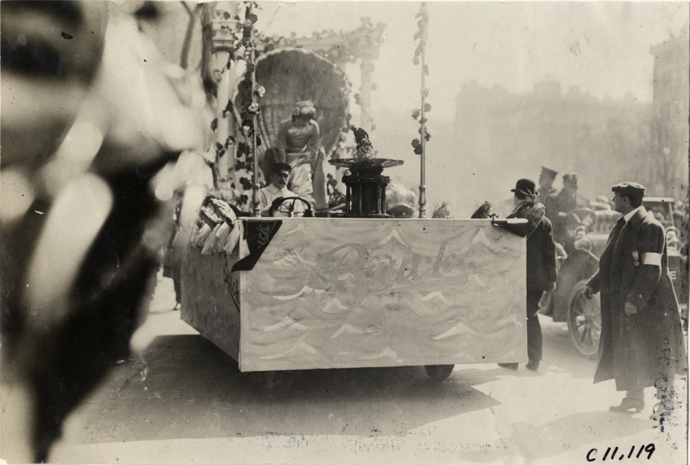 Annette Kellerman riding on Buick float, 1909 New York automobile carnival