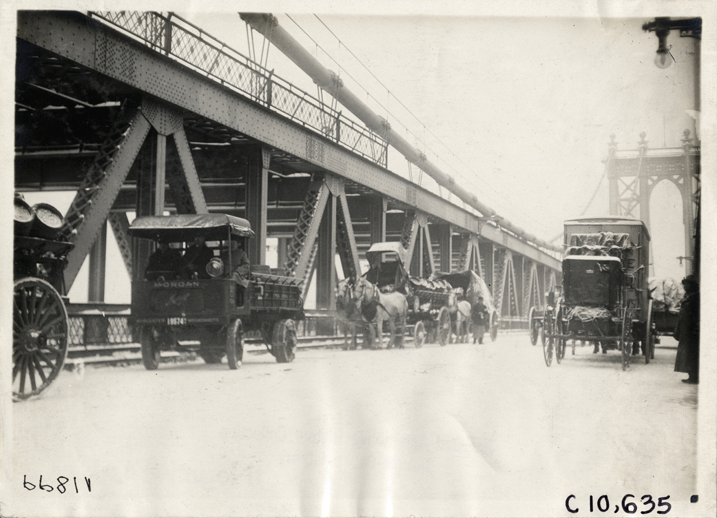1911 Morgan truck, traveling on bridge