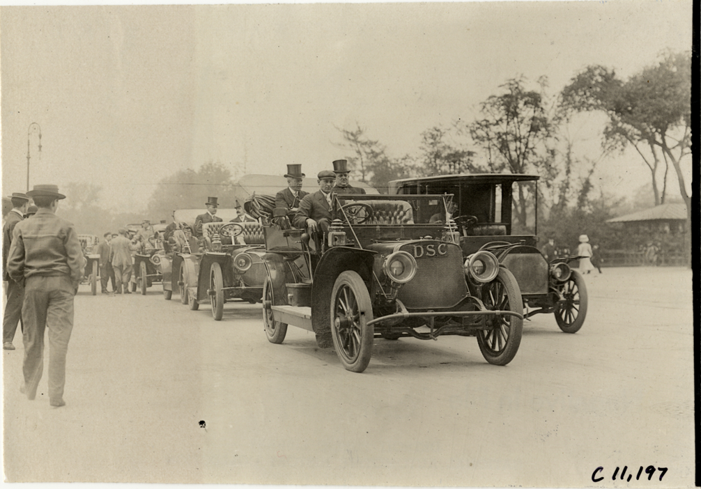 Officials in automobiles, 1909 New York street cleaners parade