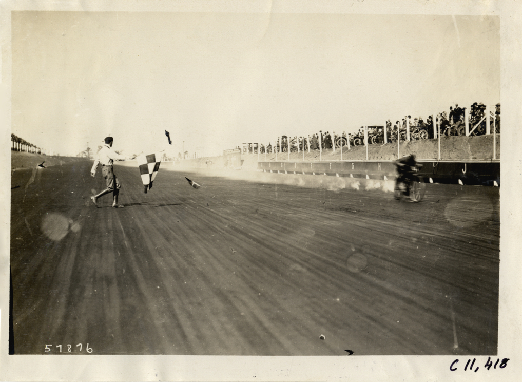 Motorcyclist crossing finish line, Atlanta Speedway