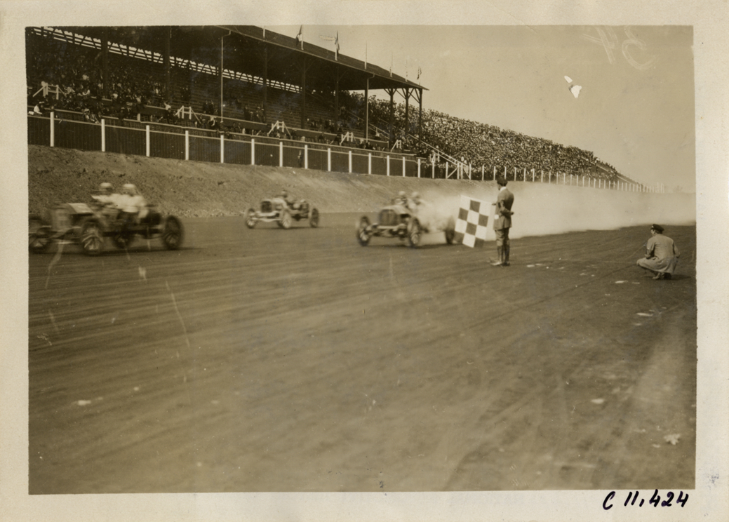 Racecars crossing finish line, Atlanta Speedway