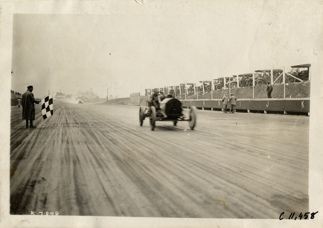 Racecar crossing finish line, Atlanta Speedway