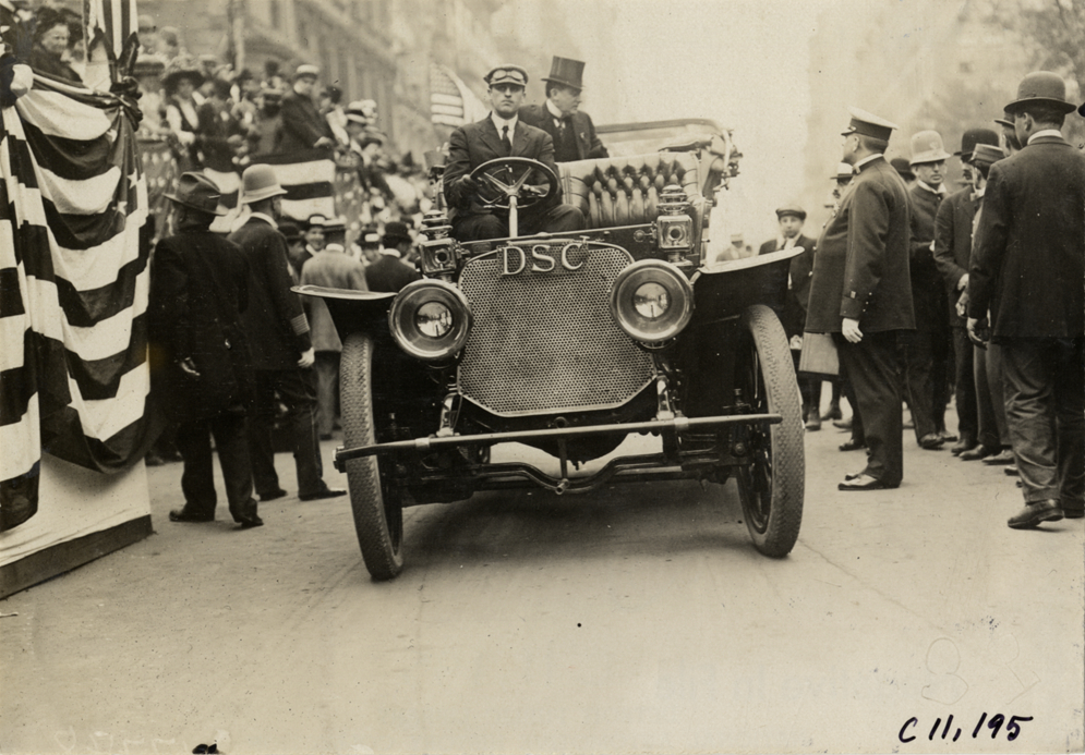 Official in automobile, 1909 New York street cleaners parade