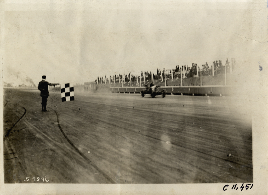 Racecar crossing finish line, Atlanta Speedway