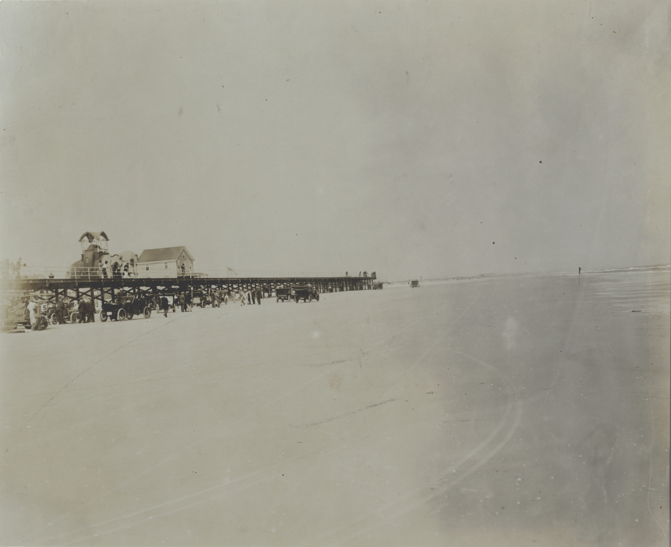 Automobiles parked on beach before race, Atlantic City