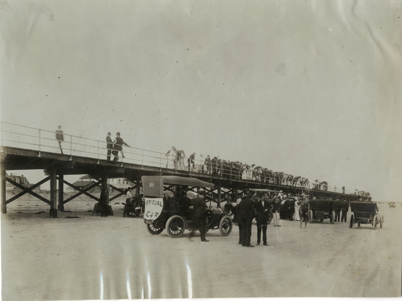 Automobiles parked on beach before race, Atlantic City