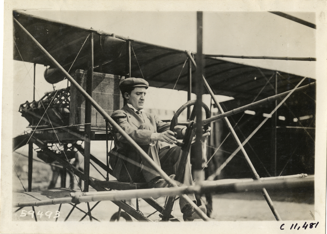 Aviator in biplane, Atlanta Speedway