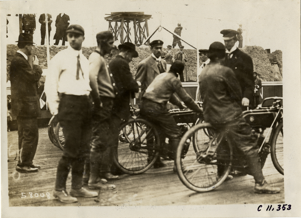 Motorcyclists and officials at starting line, Atlanta Speedway