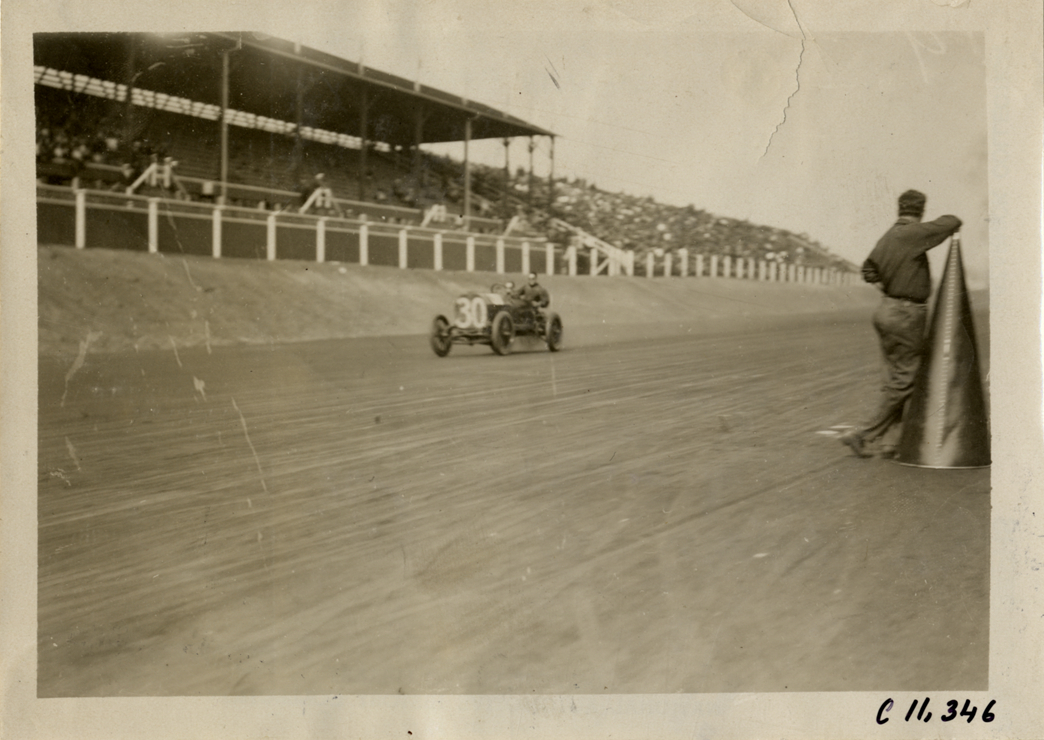 Driver and passenger in racecar, Atlanta Speedway