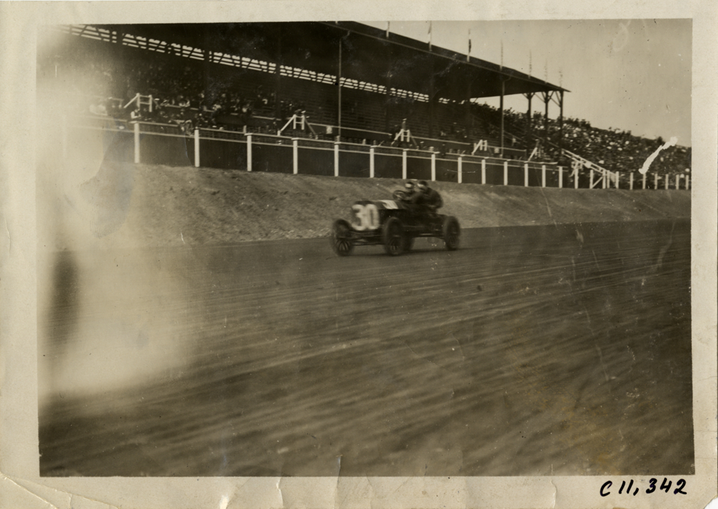 Driver and passenger in racecar, Atlanta Speedway