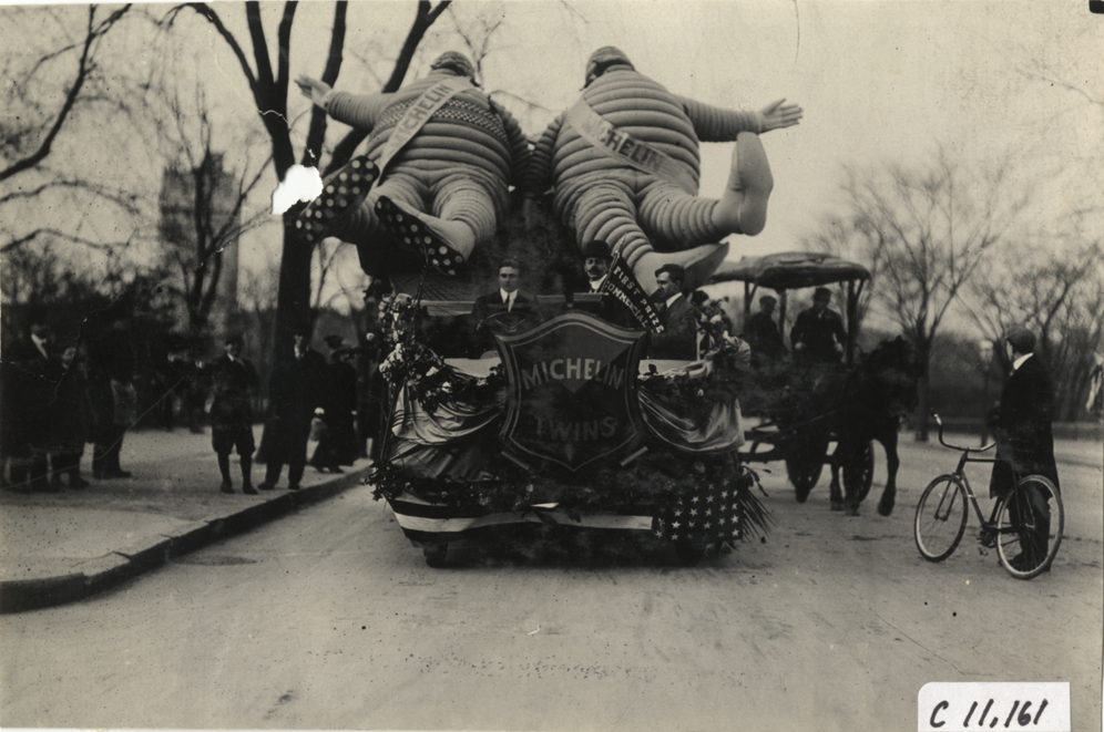 Michelin parade float featuring Michelin Twins, 1909 New York automobile carnival