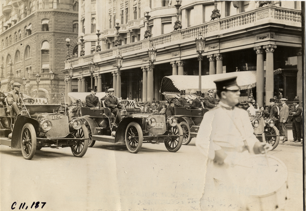Officials in automobiles, 1909 New York street cleaners parade