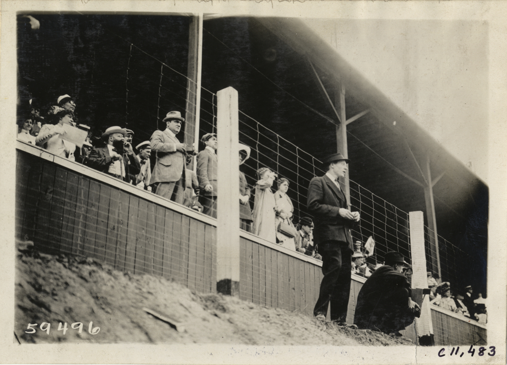 Spectators watching automobile race, Atlanta Speedway