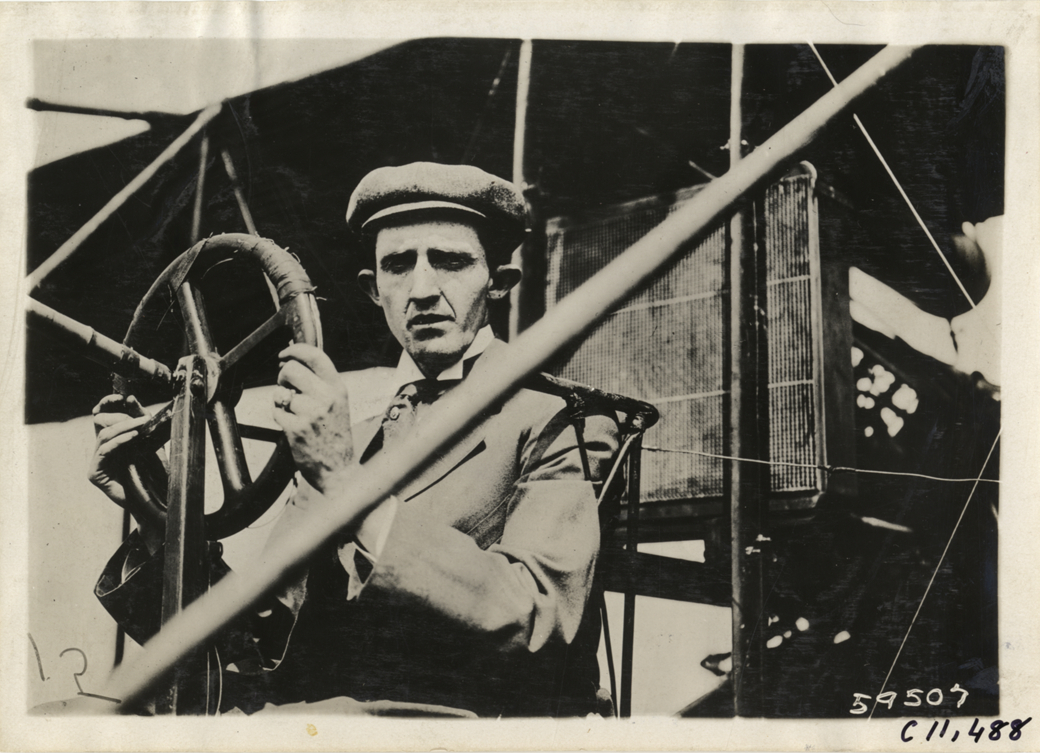 Aviator in biplane, Atlanta Speedway