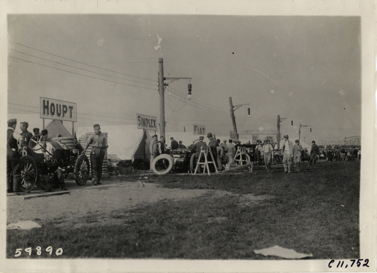 Men with racecars in front of tents, 1909 Brighton Beach races