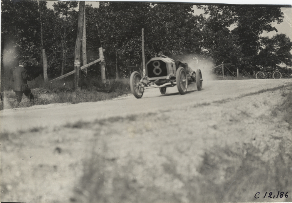 Driver in racecar, 1909 Crown Point races