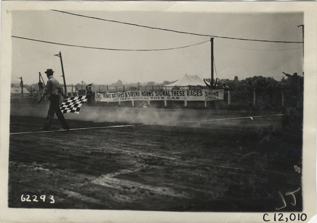 Official standing at finish line, 1910 Brighton Beach races