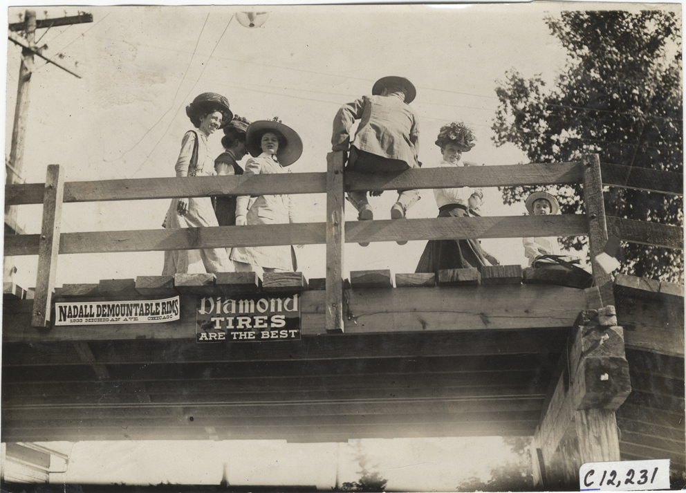 Spectators on bridge, 1909 Crown Point races