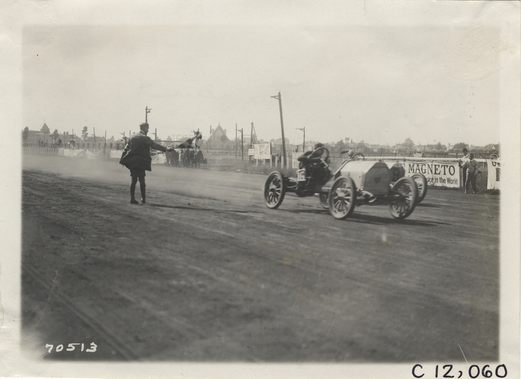 Jack Tower crossing finish line, 1911 Brighton Beach races
