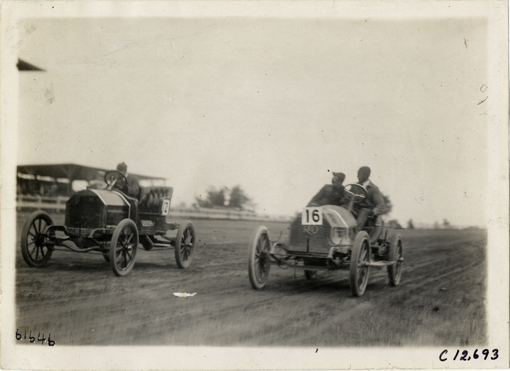Two racecars on track, 1910 Empire City races