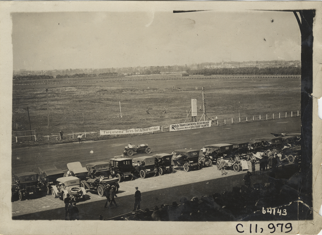 Automobiles parked along racetrack, 1910 Brighton Beach races