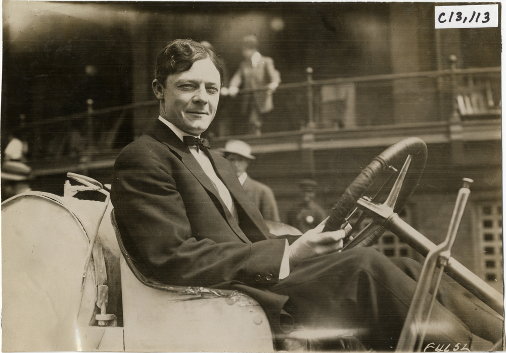Harry Michener in racecar, 1908 Grand Prize races