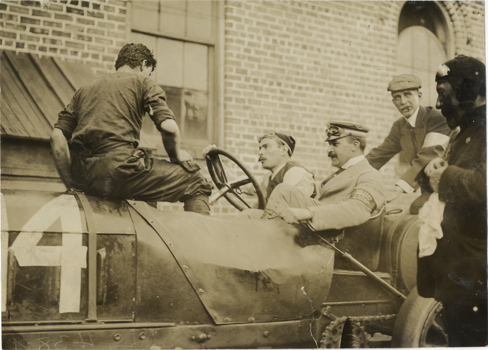 Louis Wagner, Mayor George Tiedeman and officials in racecar, 1908 Grand Prize races