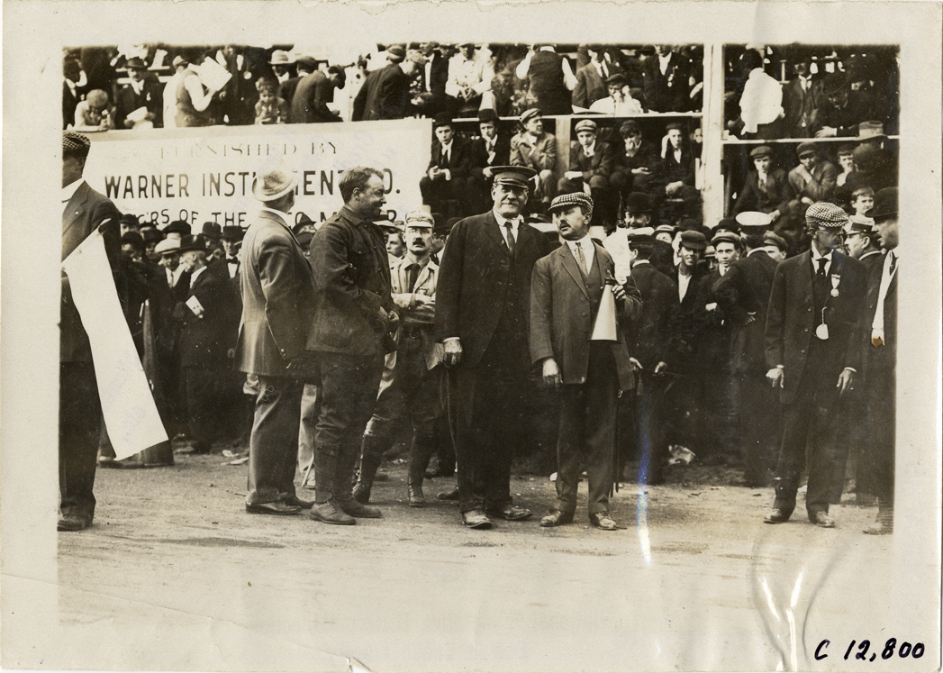 George Robertson with racing officials, 1909 Fairmount Park races
