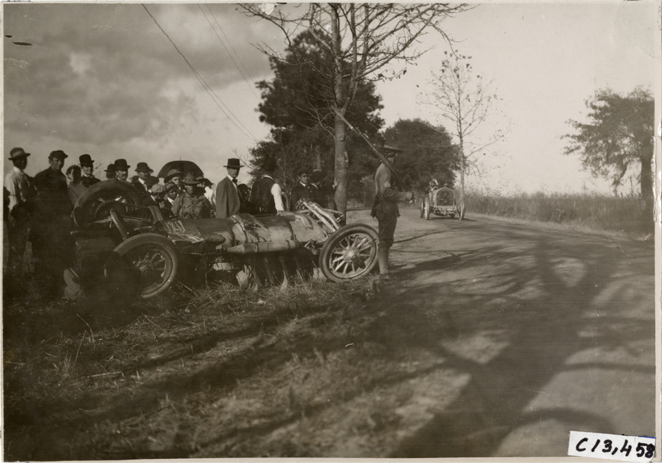 Driver and passenger in racecar, 1908 Grand Prize races